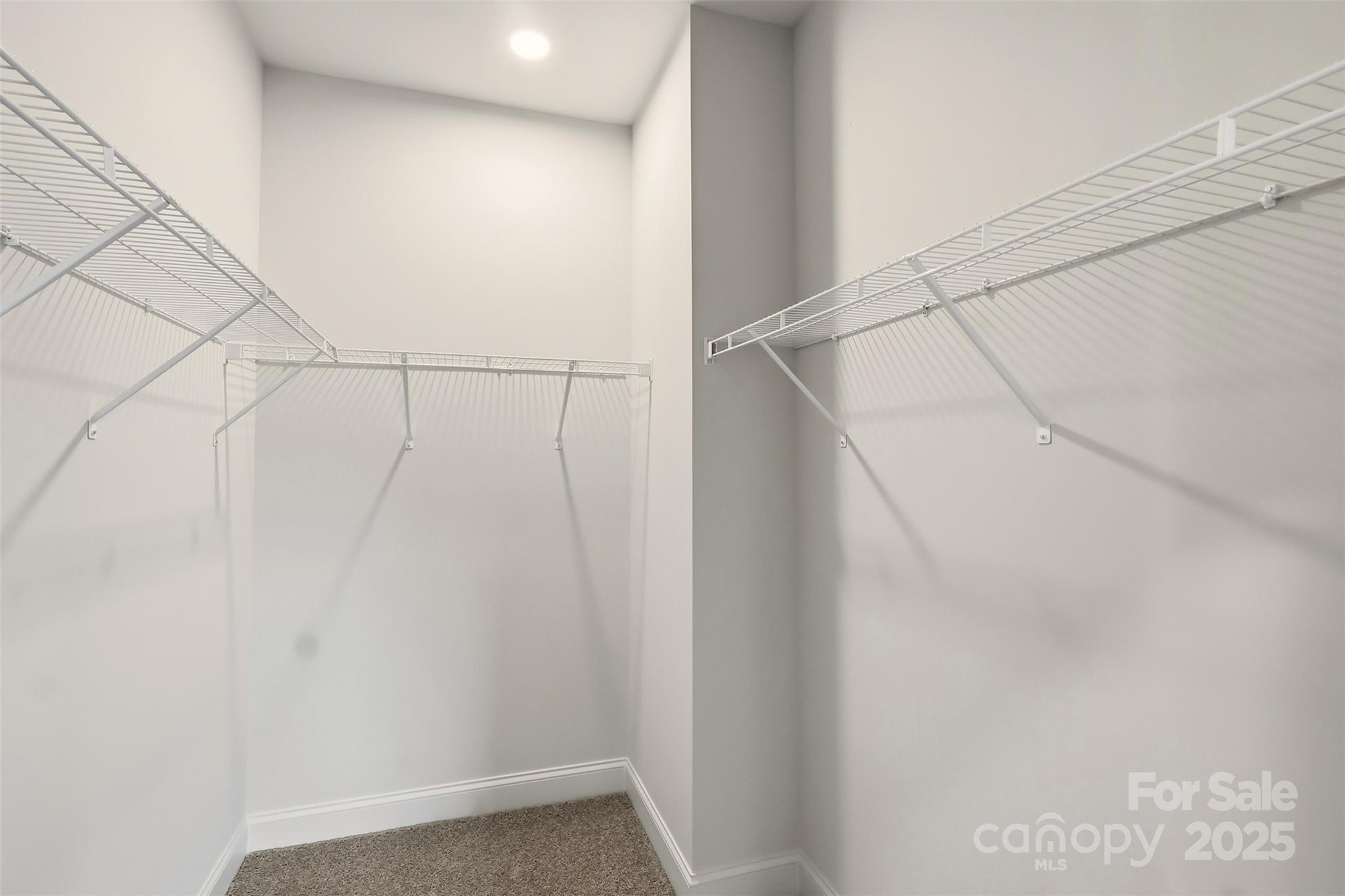 126 North Main Street Granite Falls, NC 28630 - Photo 16 of 34 a view of a room with racks on the wall