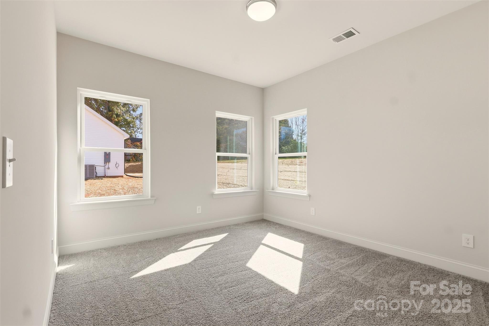 126 North Main Street Granite Falls, NC 28630 - Photo 22 of 34 an empty room with windows