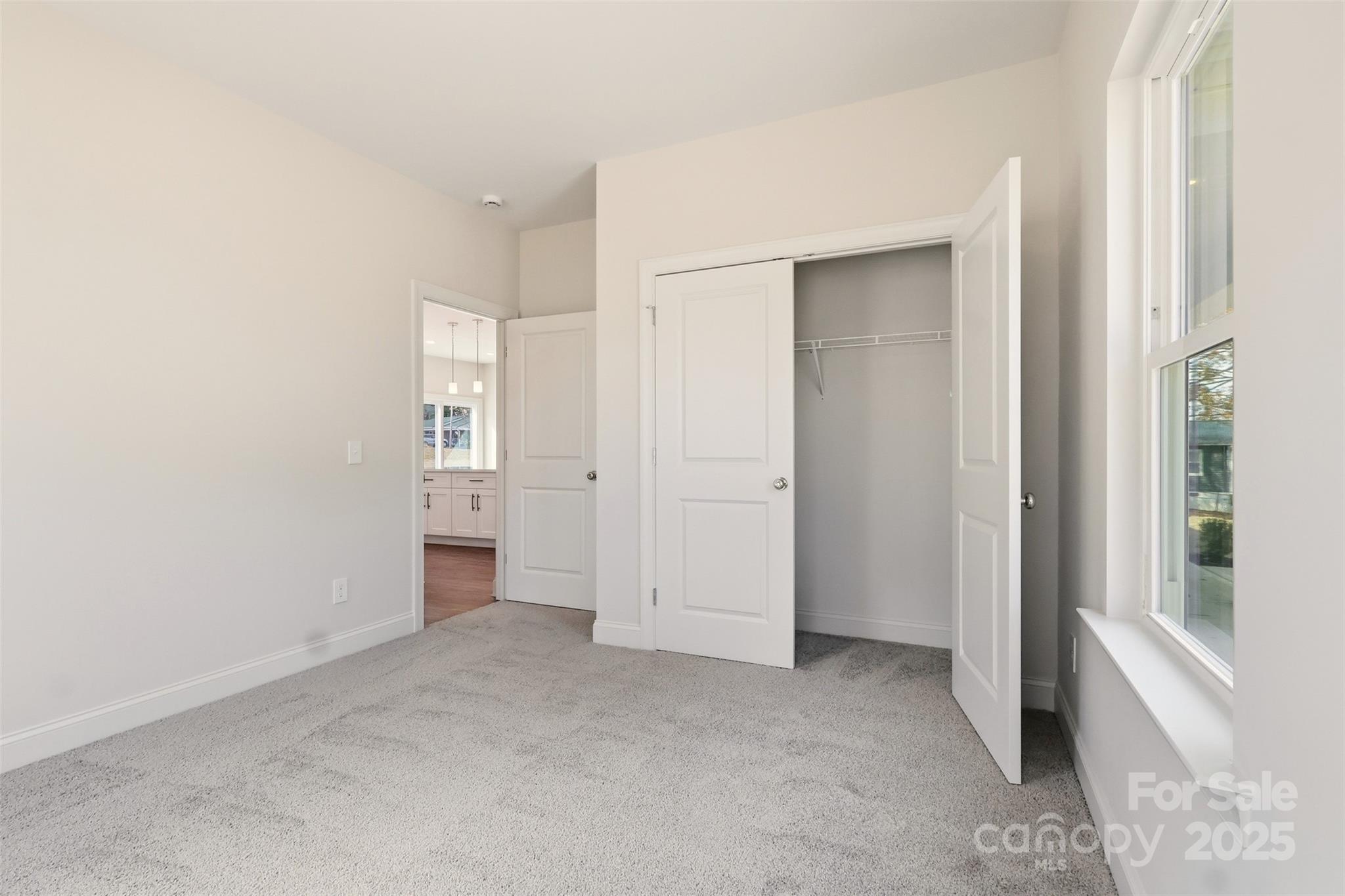 126 North Main Street Granite Falls, NC 28630 - Photo 25 of 34 wooden floor and closet in a room