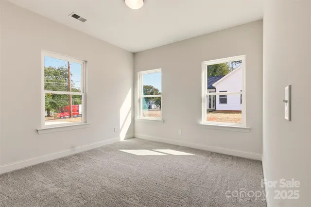 a view of a window in an empty room