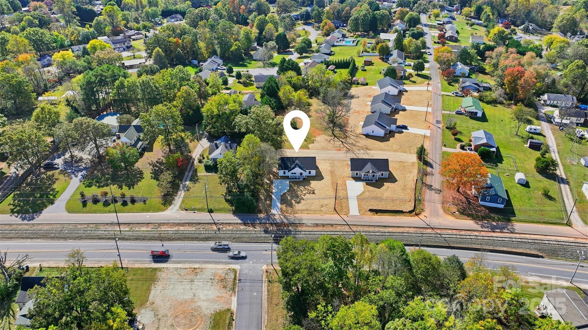 126 North Main Street Granite Falls, NC 28630 - Photo 33 of 34 an aerial view of a house with a yard and plants