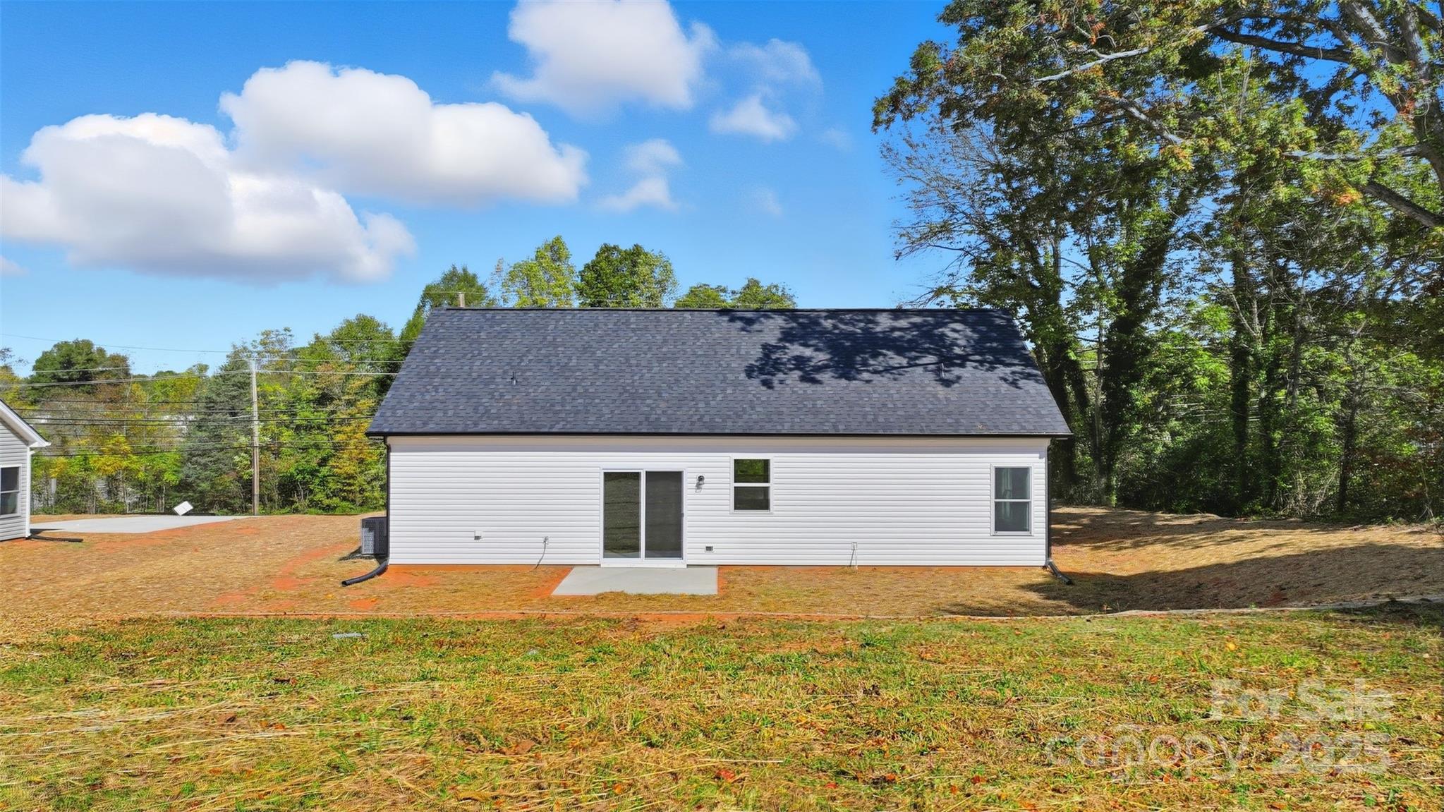 126 North Main Street Granite Falls, NC 28630 - Photo 5 of 34 a backyard of a house with lots of green space
