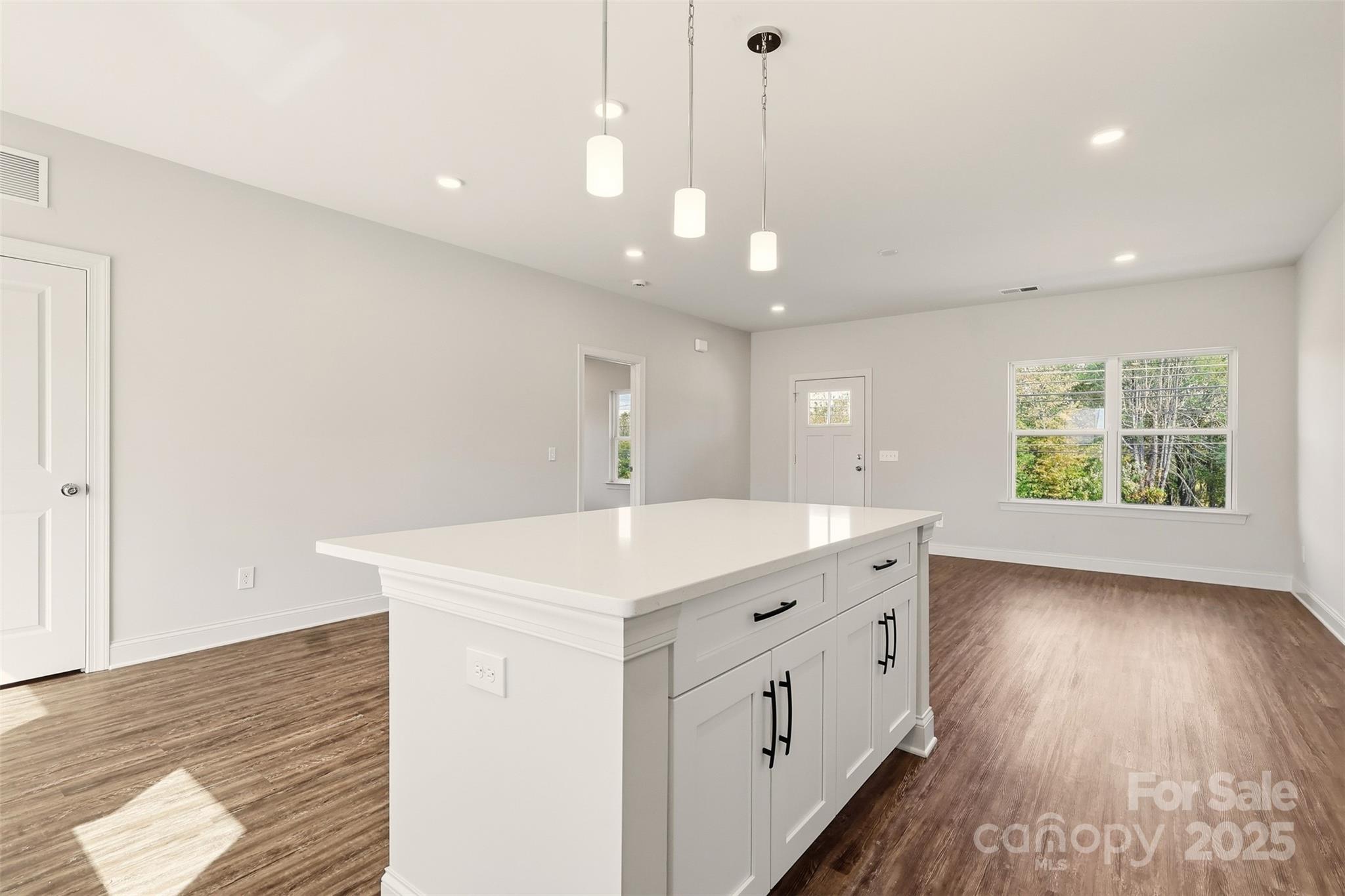 126 North Main Street Granite Falls, NC 28630 - Photo 10 of 34 a view of a hallway with wooden floor