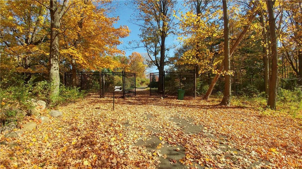 71 Old Farm Road Weston, CT 06883 - Photo 1 of 1 a view of a yard with yellow house