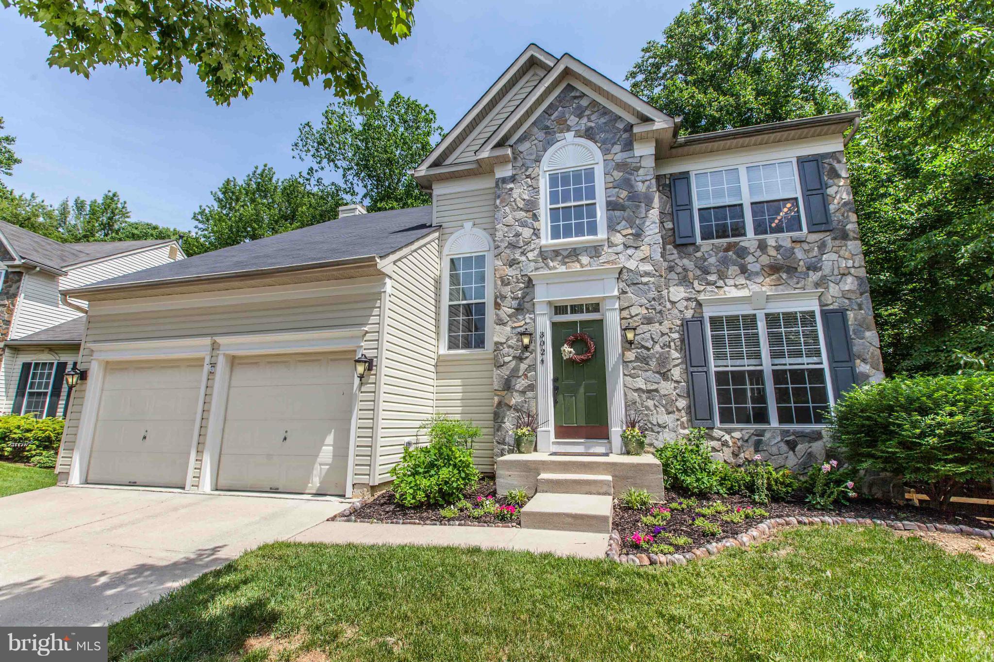 3024 Old Channel Road Laurel, MD 20724 - Photo 1 of 17 a front view of a house with a garden and plants