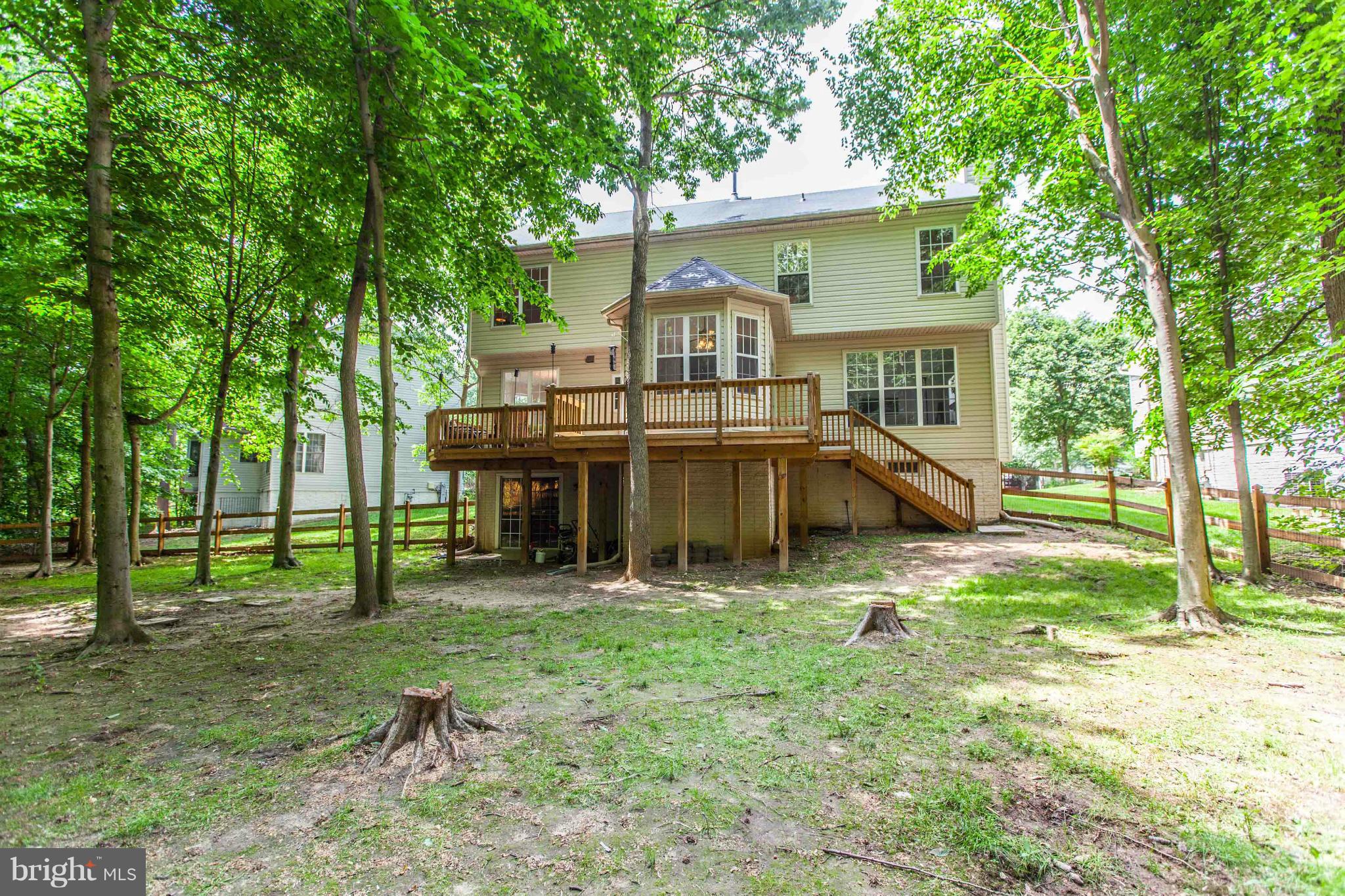 3024 Old Channel Road Laurel, MD 20724 - Photo 17 of 17 a view of a house with backyard and a tree
