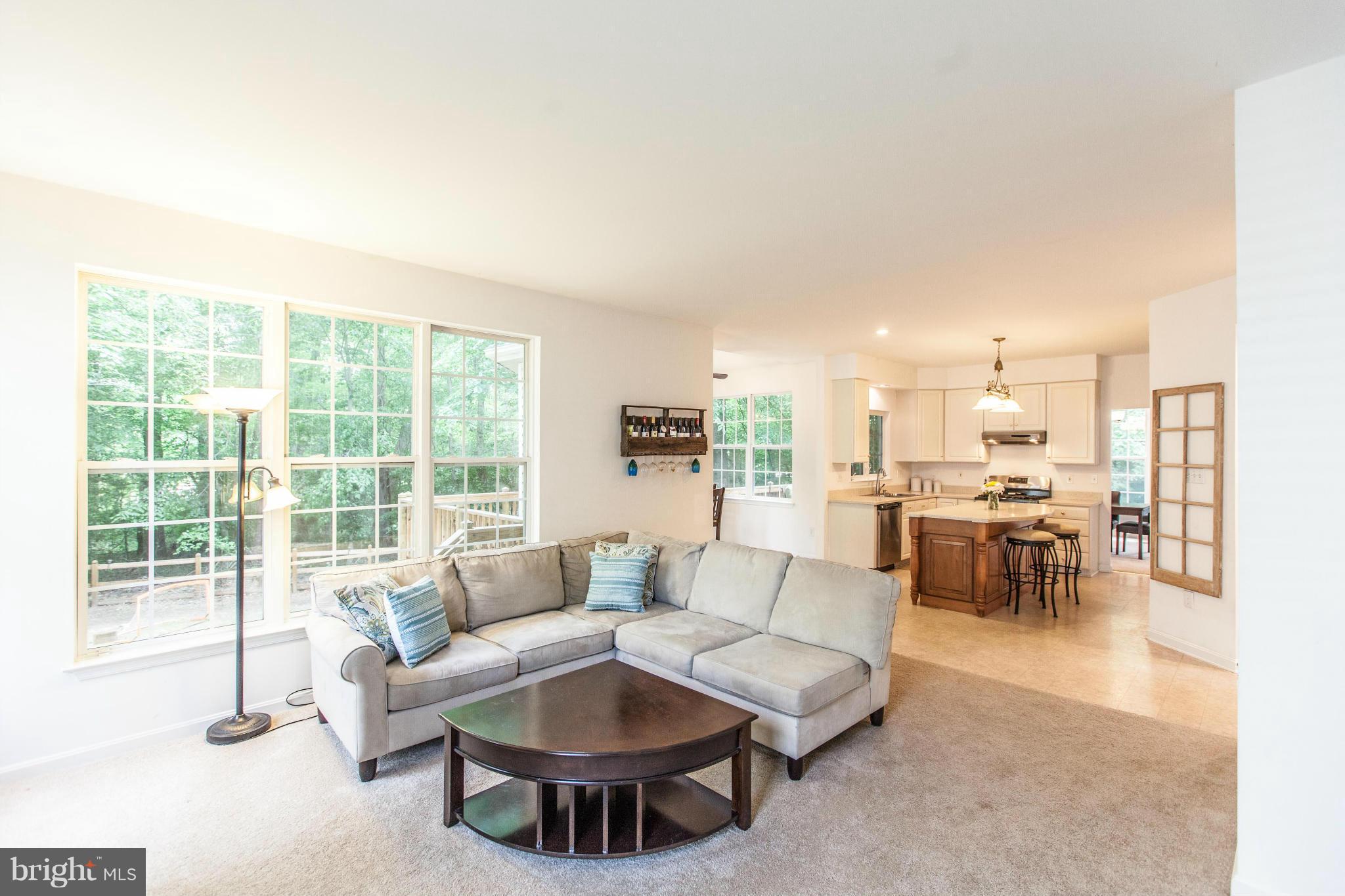 3024 Old Channel Road Laurel, MD 20724 - Photo 6 of 17 a living room with furniture and a large window