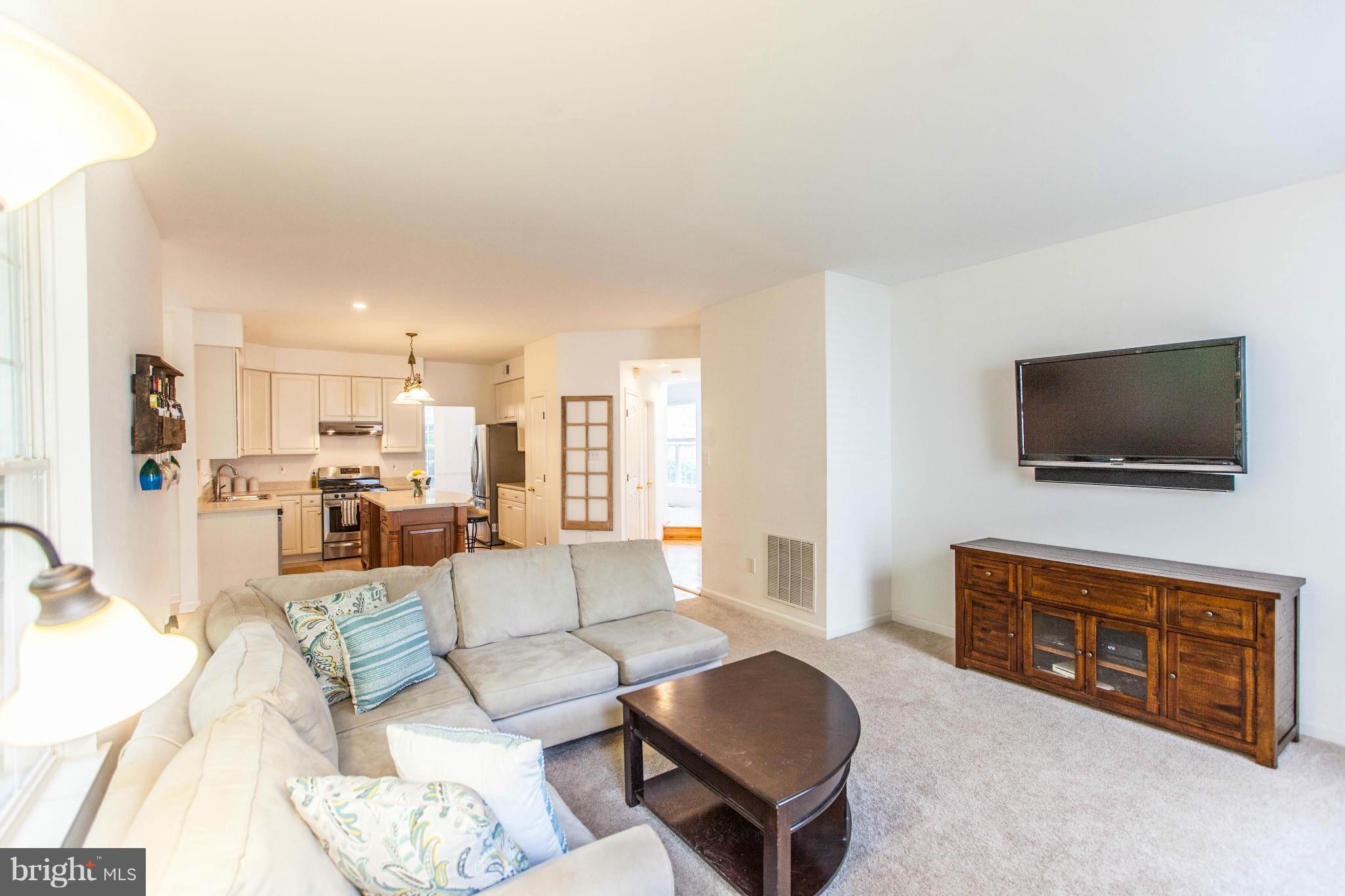 3024 Old Channel Road Laurel, MD 20724 - Photo 7 of 17 a living room with furniture and a flat screen tv