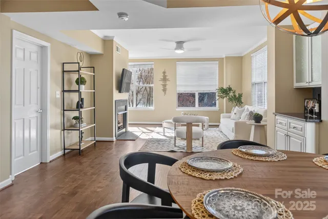a living room with furniture and a table