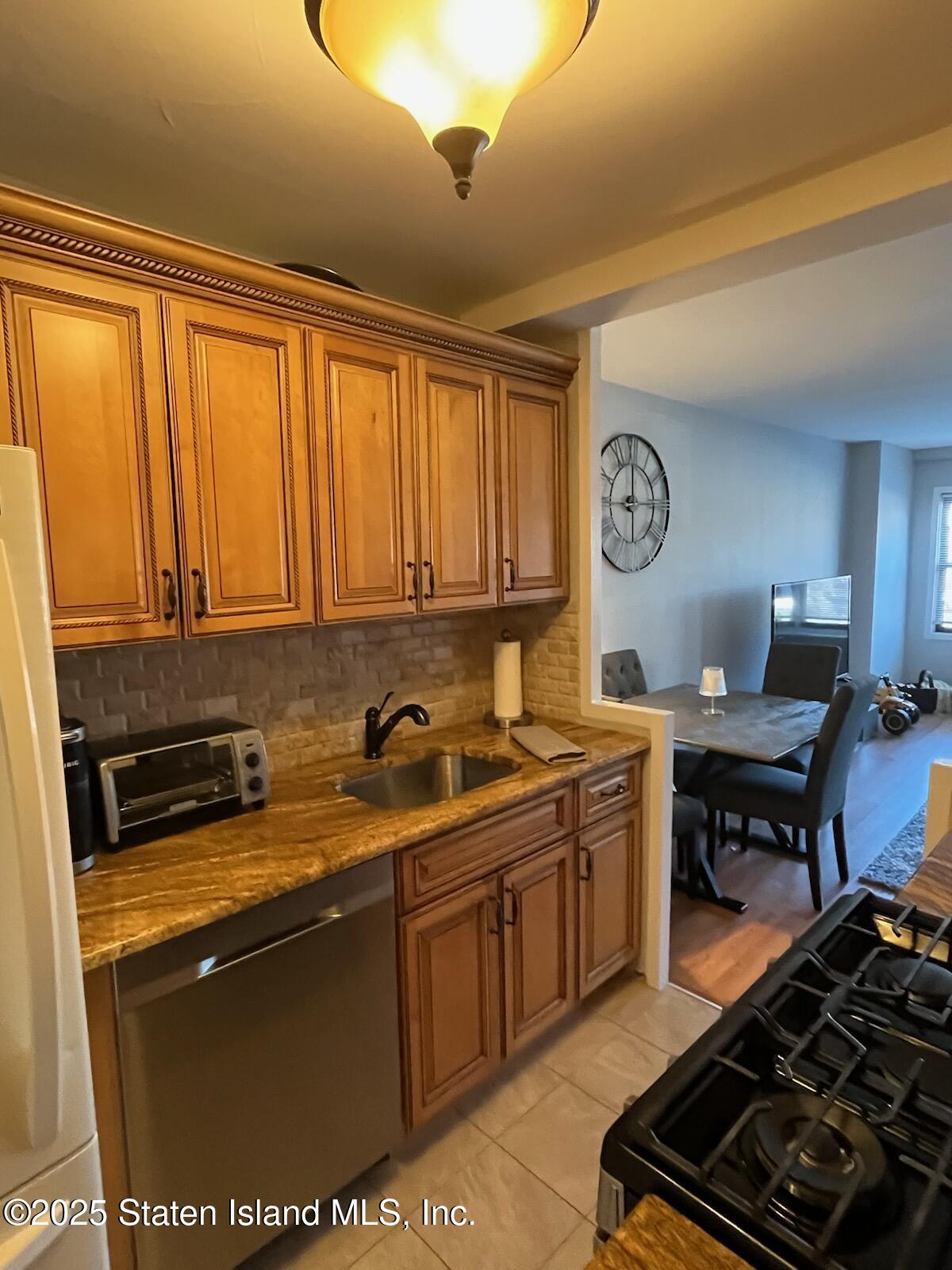 1100 Clove Road, Unit 2E Staten Island, NY 10301 - Photo 15 of 37 Galley Kitchen
