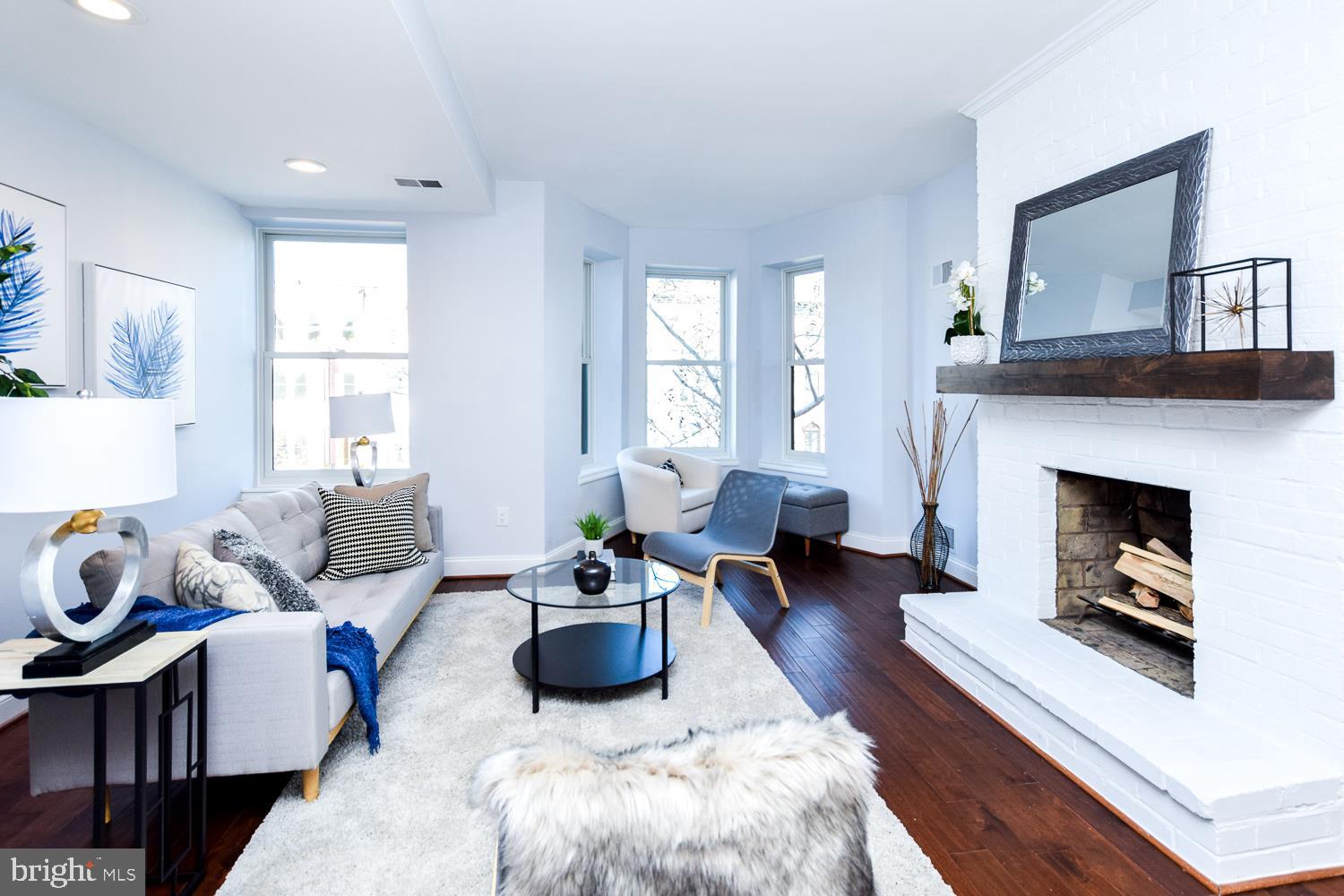 1722 U Street Northwest, Unit C Washington, DC 20009 - Photo 7 of 18 Living Area with Fireplace