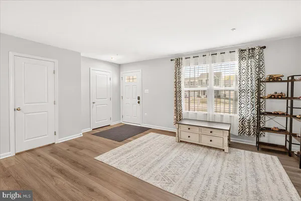 a view of a bedroom with furniture and empty room