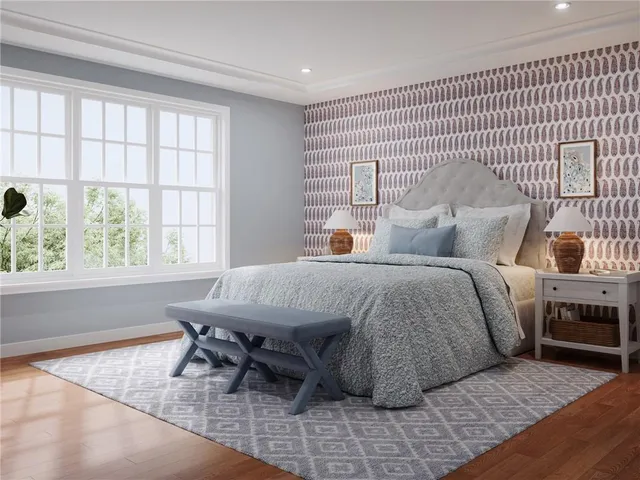 a bedroom with a bed and a table in it