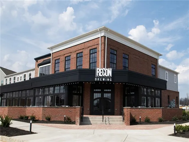 a view of a building with a street