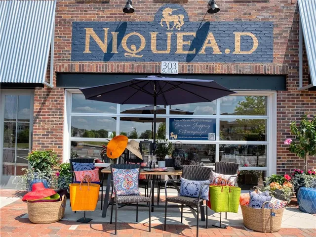 a view of a chairs and table in patio