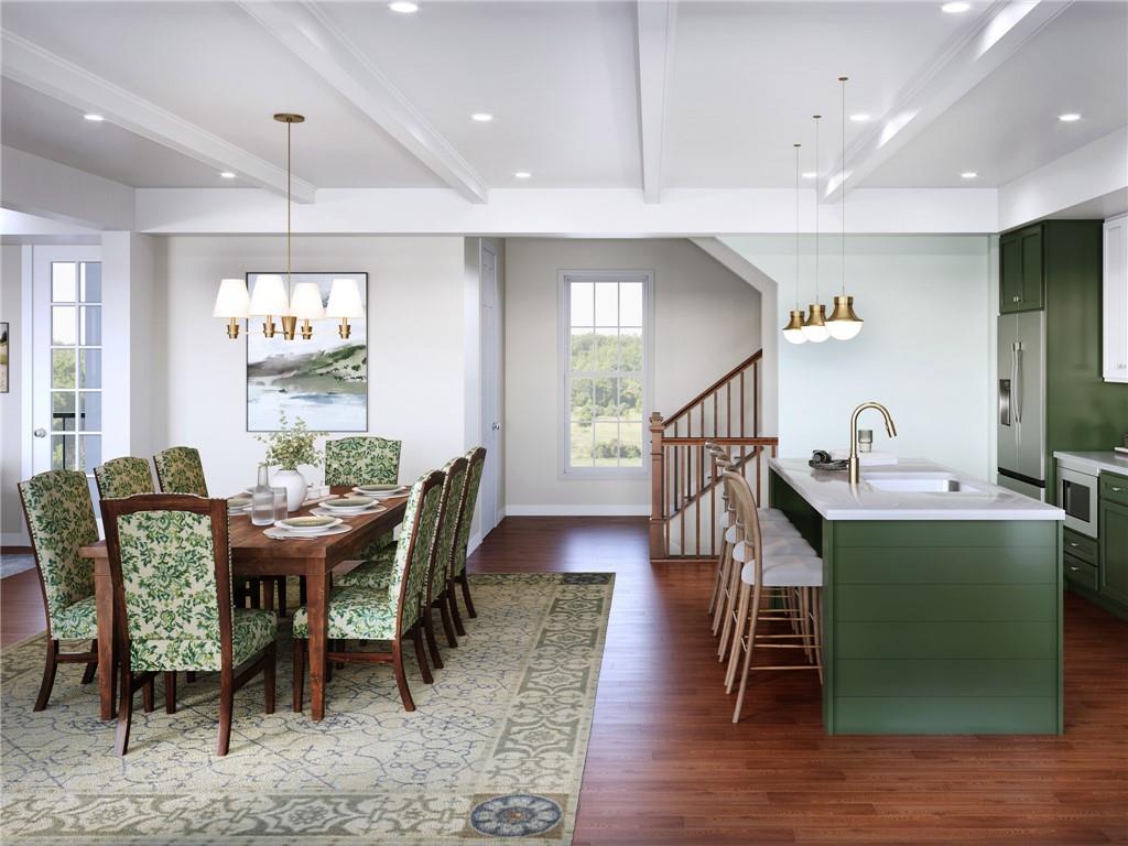 903 Strand Road Cranberry Township, PA 16066 - Photo 3 of 33 a view of a dining room with furniture window and wooden floor
