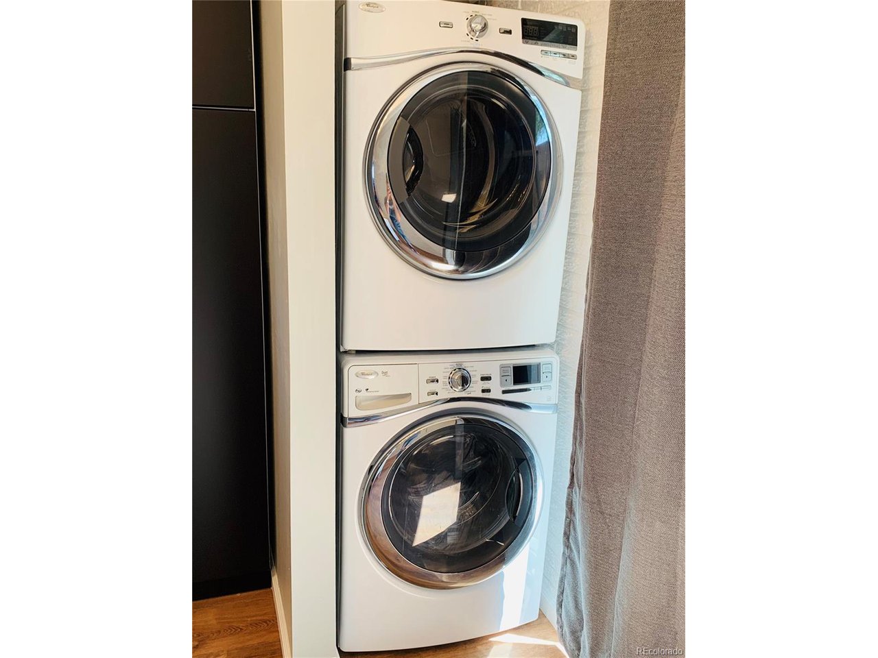 1040 Stuart Street Denver, CO 80204 - Photo 12 of 30 a utility room with dryer and washer