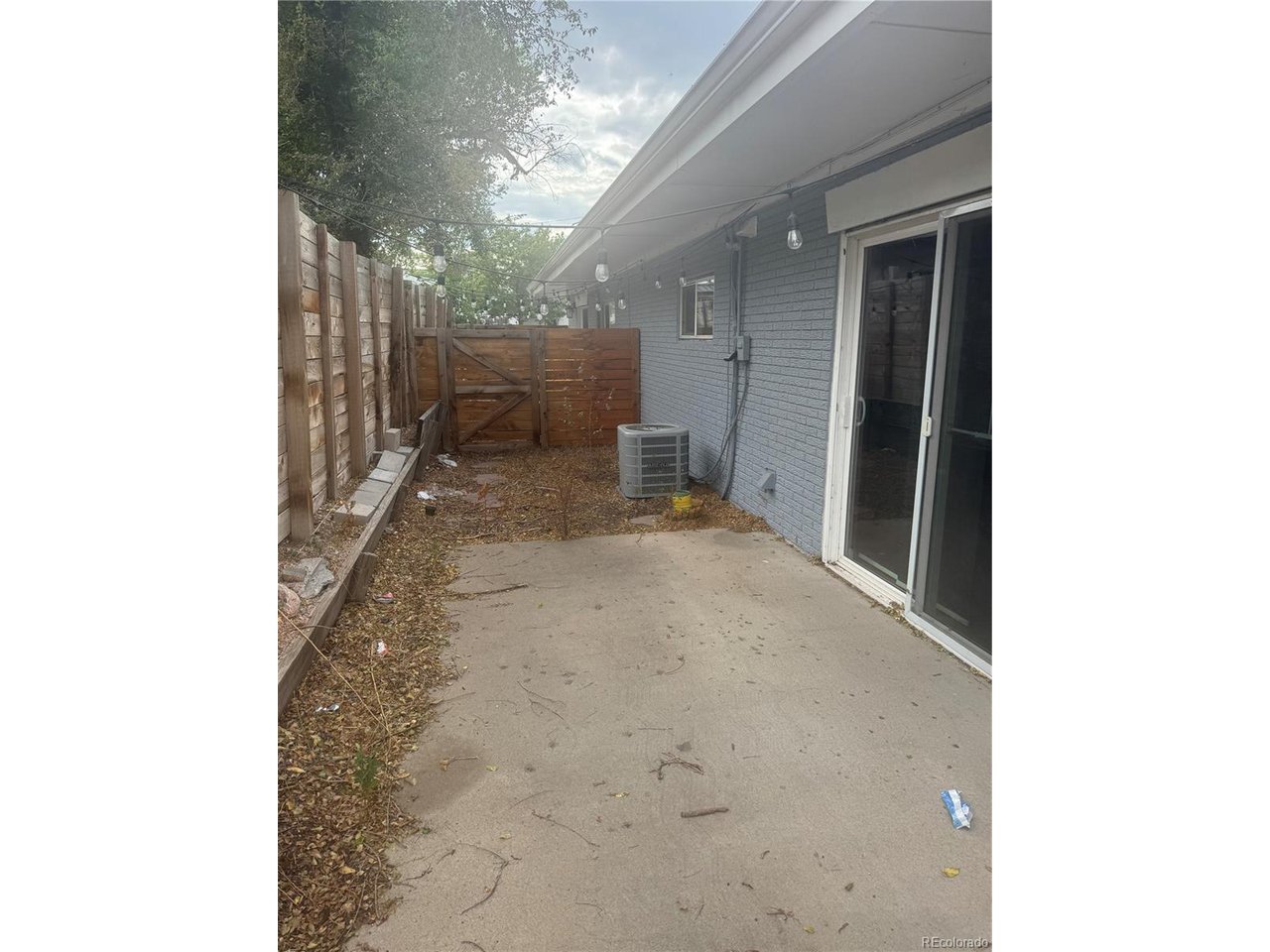 1040 Stuart Street Denver, CO 80204 - Photo 18 of 30 a view of a hallway with brick walls