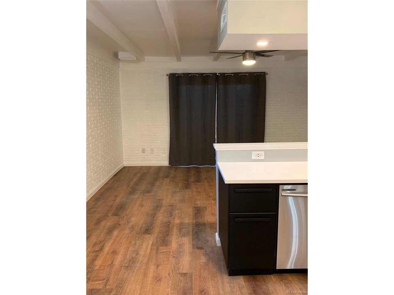 1040 Stuart Street Denver, CO 80204 - Photo 9 of 30 a bathroom with a sink and a mirror