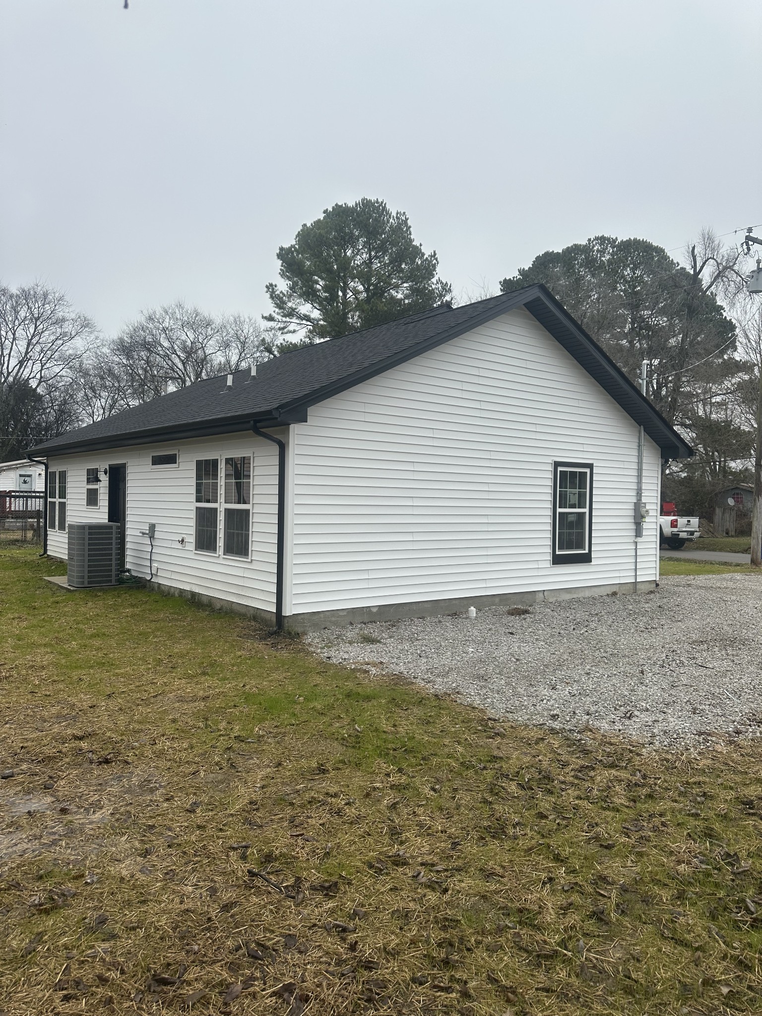 509 Brakefield Street Cowan, TN 37318 - Photo 4 of 19 a view of a house with a yard