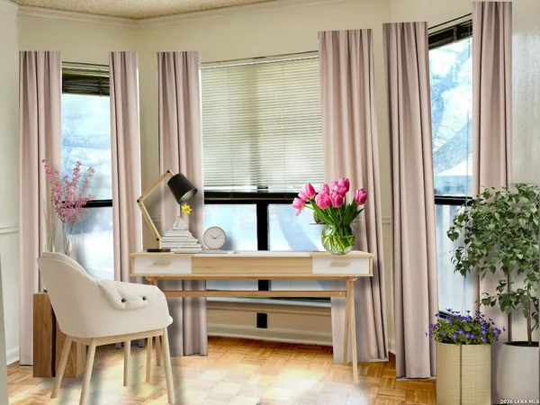 an ocean view with wooden floor and a window