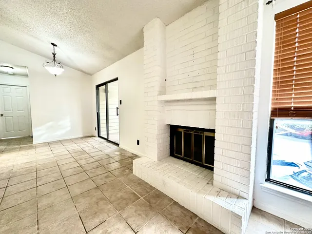 a bathroom with a mirror and a shower