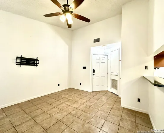 a view of a livingroom with wooden floor