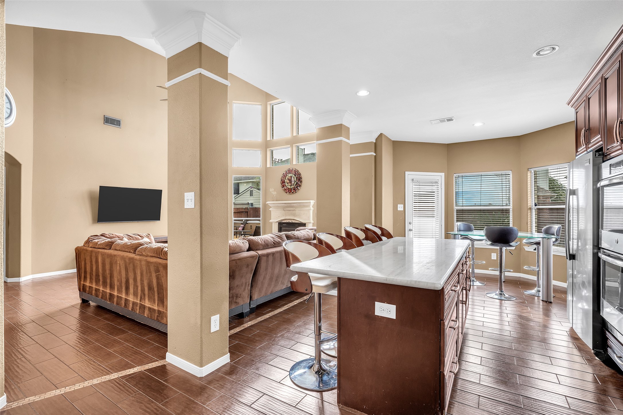 611 River Delta Lane Rosenberg, TX 77469 - Photo 20 of 39 a living room with furniture a flat screen tv and a table