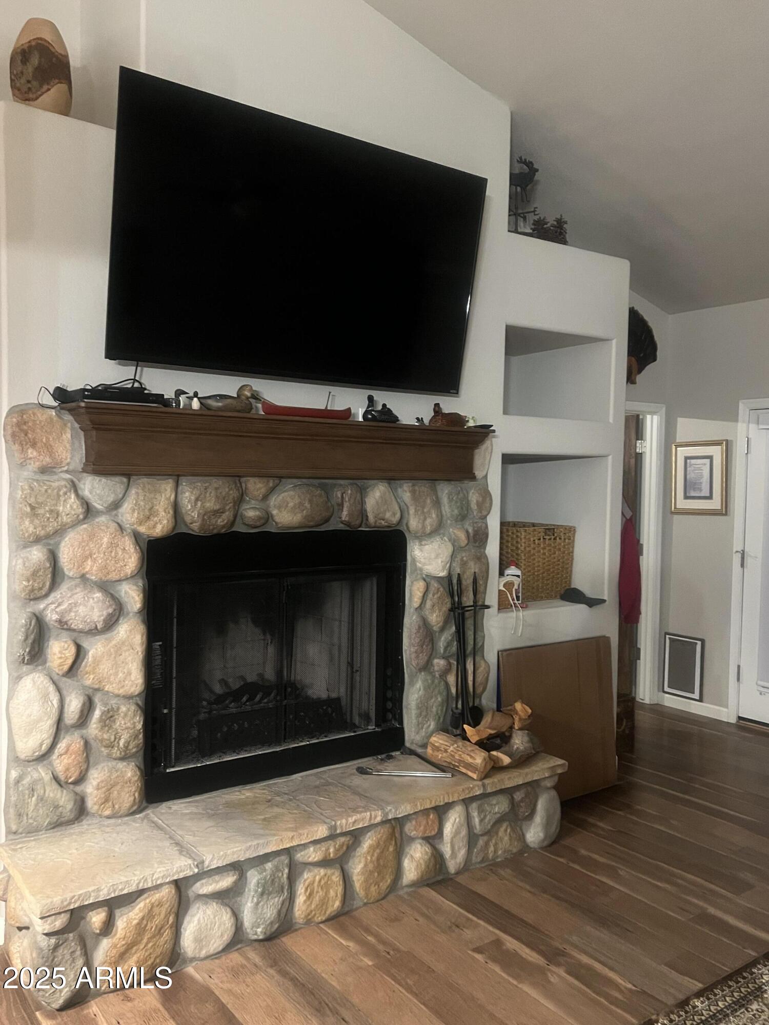 3473 High Country Drive Heber, AZ 85928 - Photo 11 of 38 a living room with furniture and a fireplace