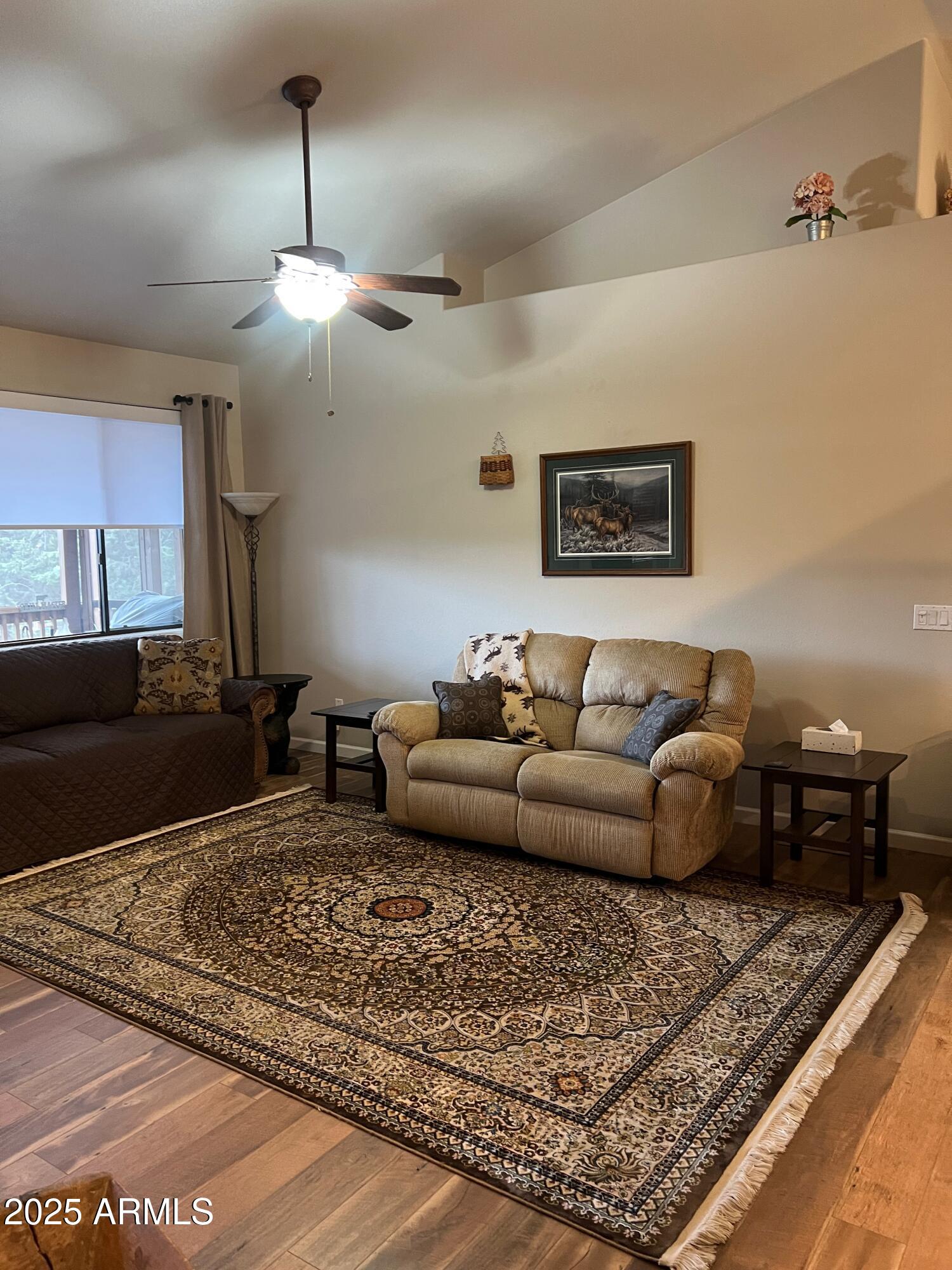 3473 High Country Drive Heber, AZ 85928 - Photo 12 of 38 a living room with furniture and a rug