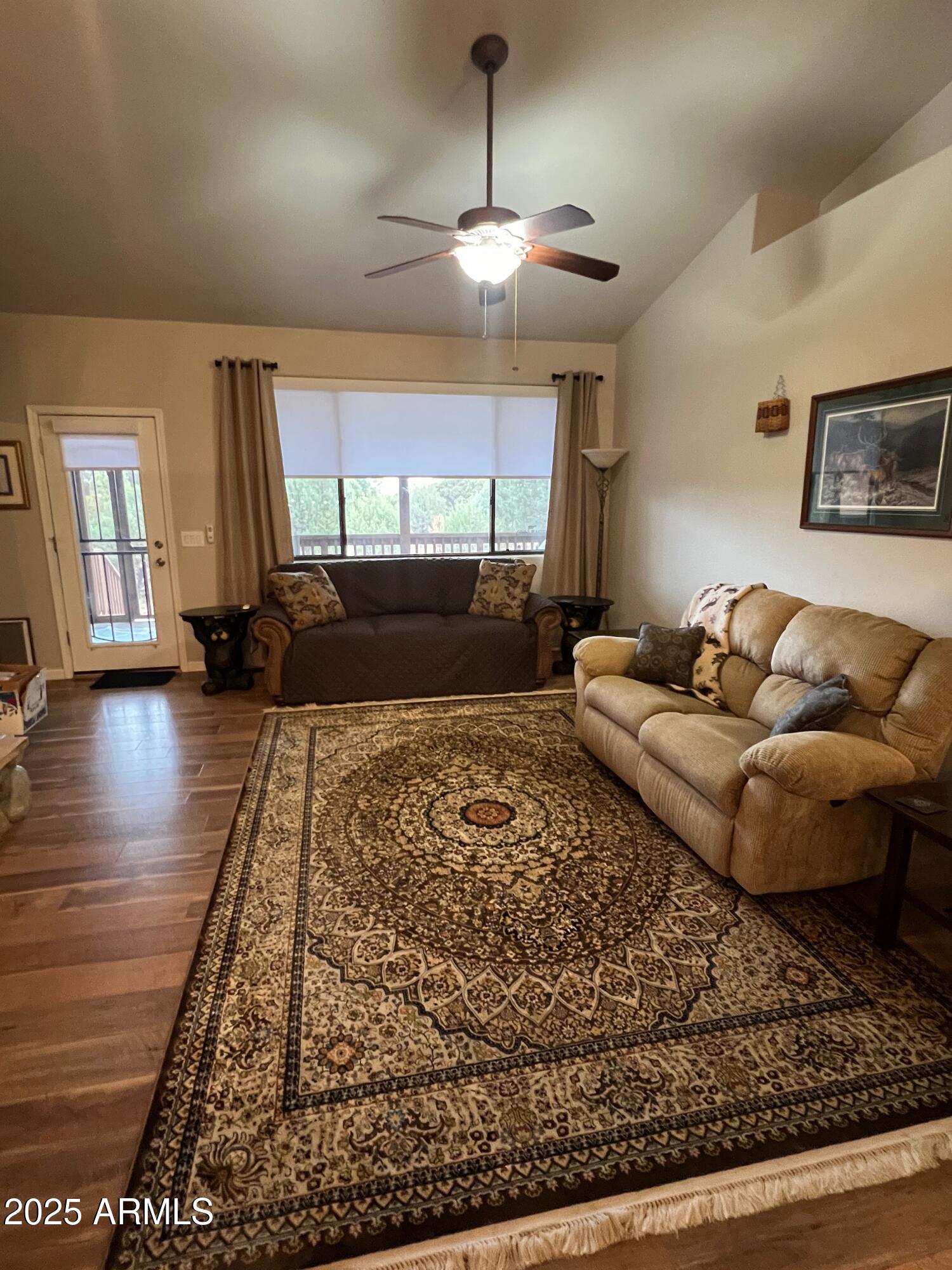 3473 High Country Drive Heber, AZ 85928 - Photo 13 of 38 a living room with furniture and a rug