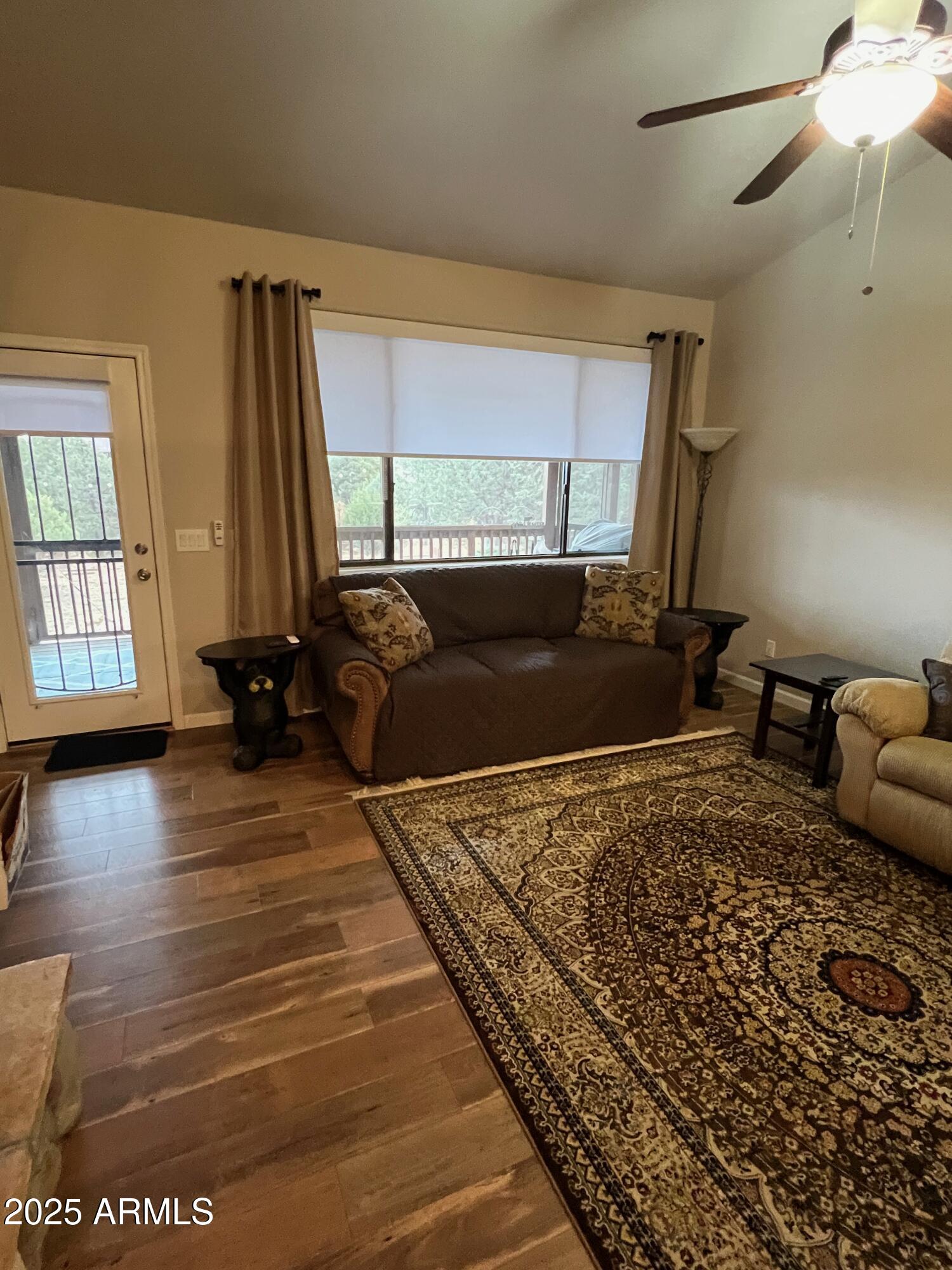 3473 High Country Drive Heber, AZ 85928 - Photo 14 of 38 a living room with a couch wooden floor and a table
