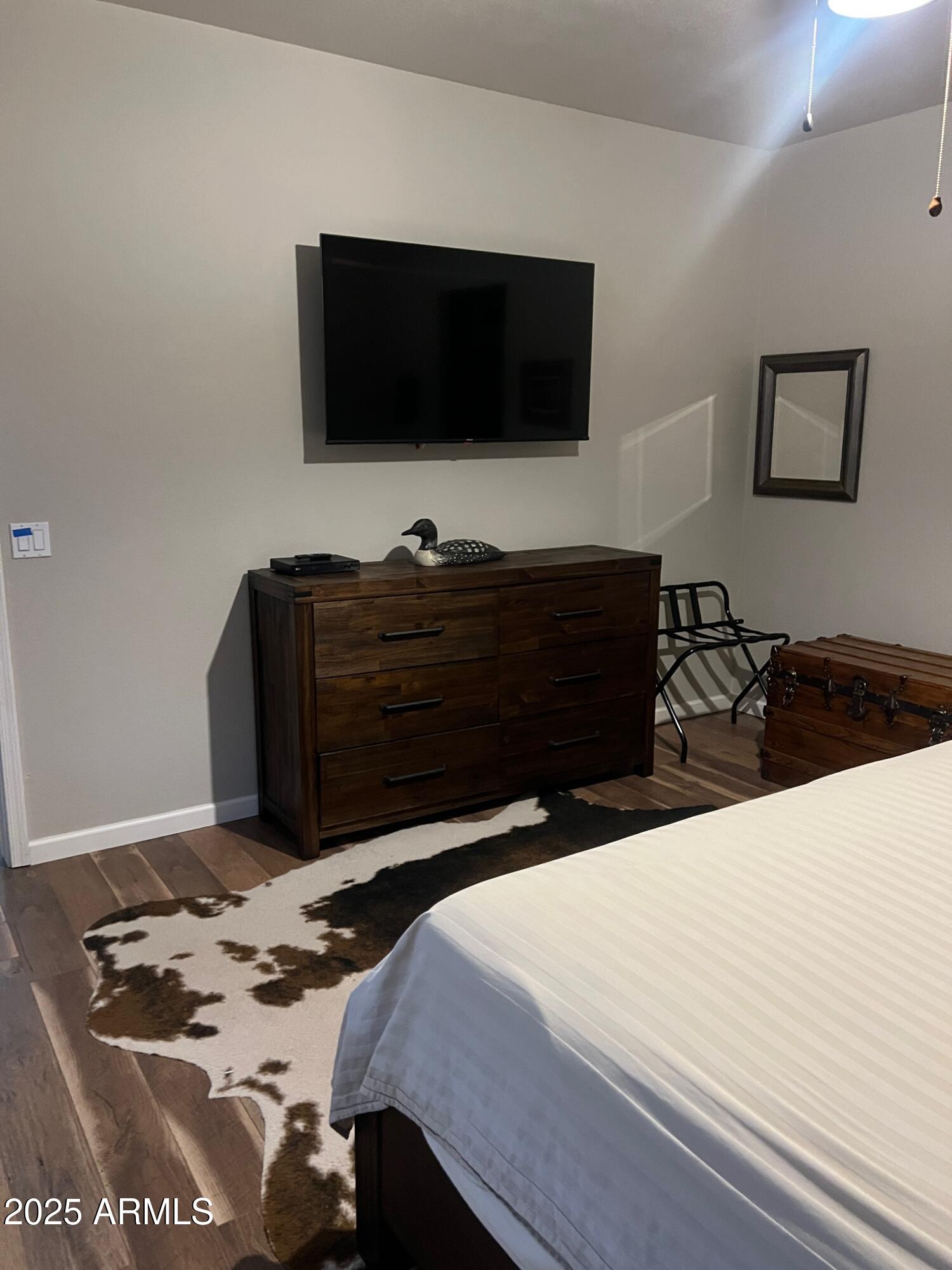3473 High Country Drive Heber, AZ 85928 - Photo 17 of 38 a bedroom with a bed and a flat screen tv