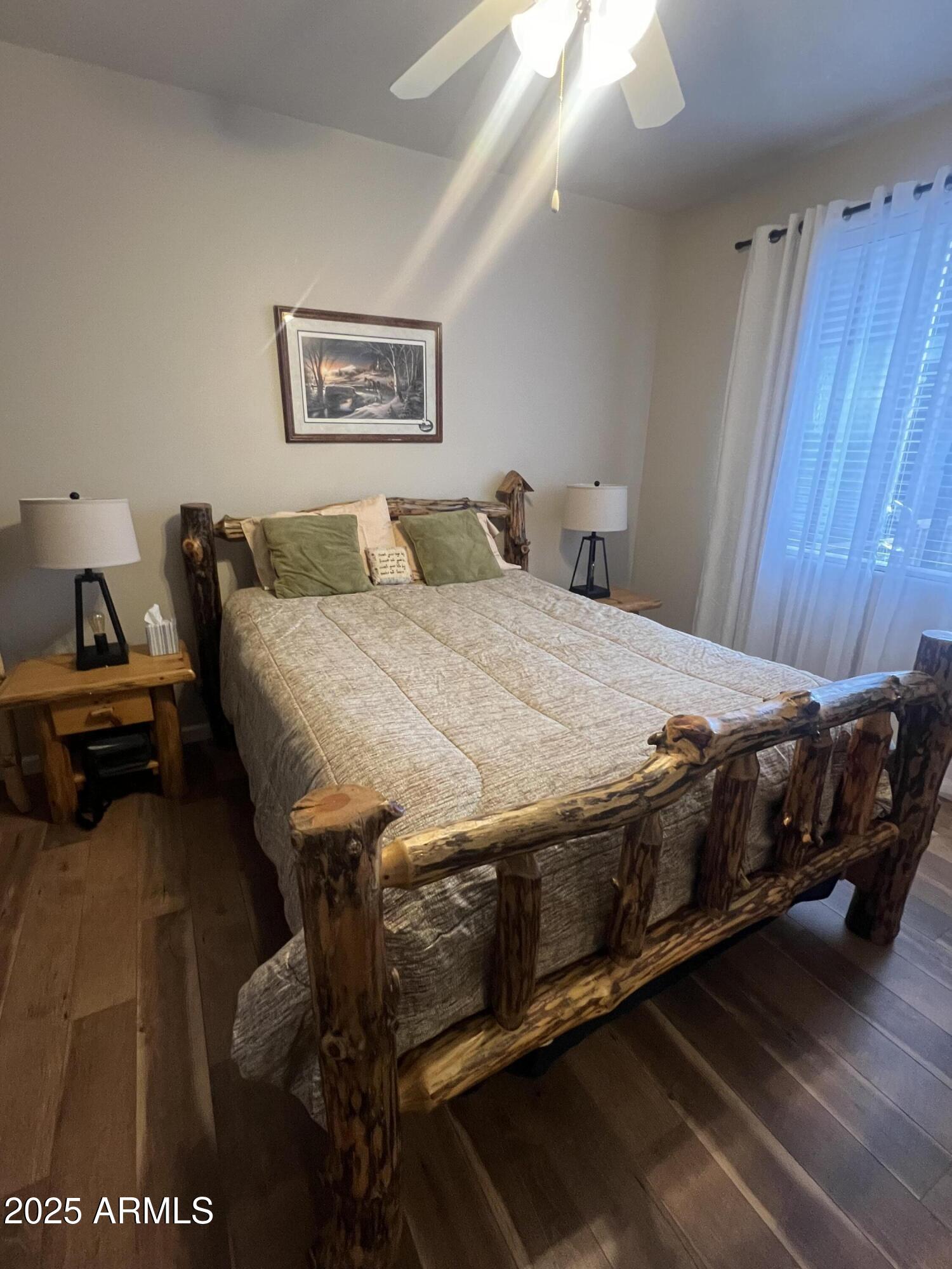 3473 High Country Drive Heber, AZ 85928 - Photo 23 of 38 a bedroom with a bed and a table in it