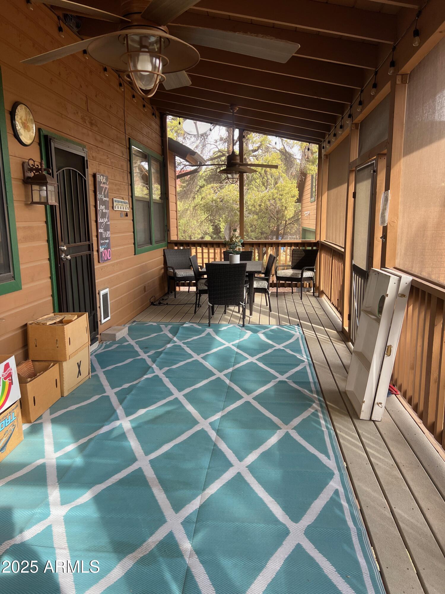 3473 High Country Drive Heber, AZ 85928 - Photo 27 of 38 a outdoor space with lots of chairs and a rug