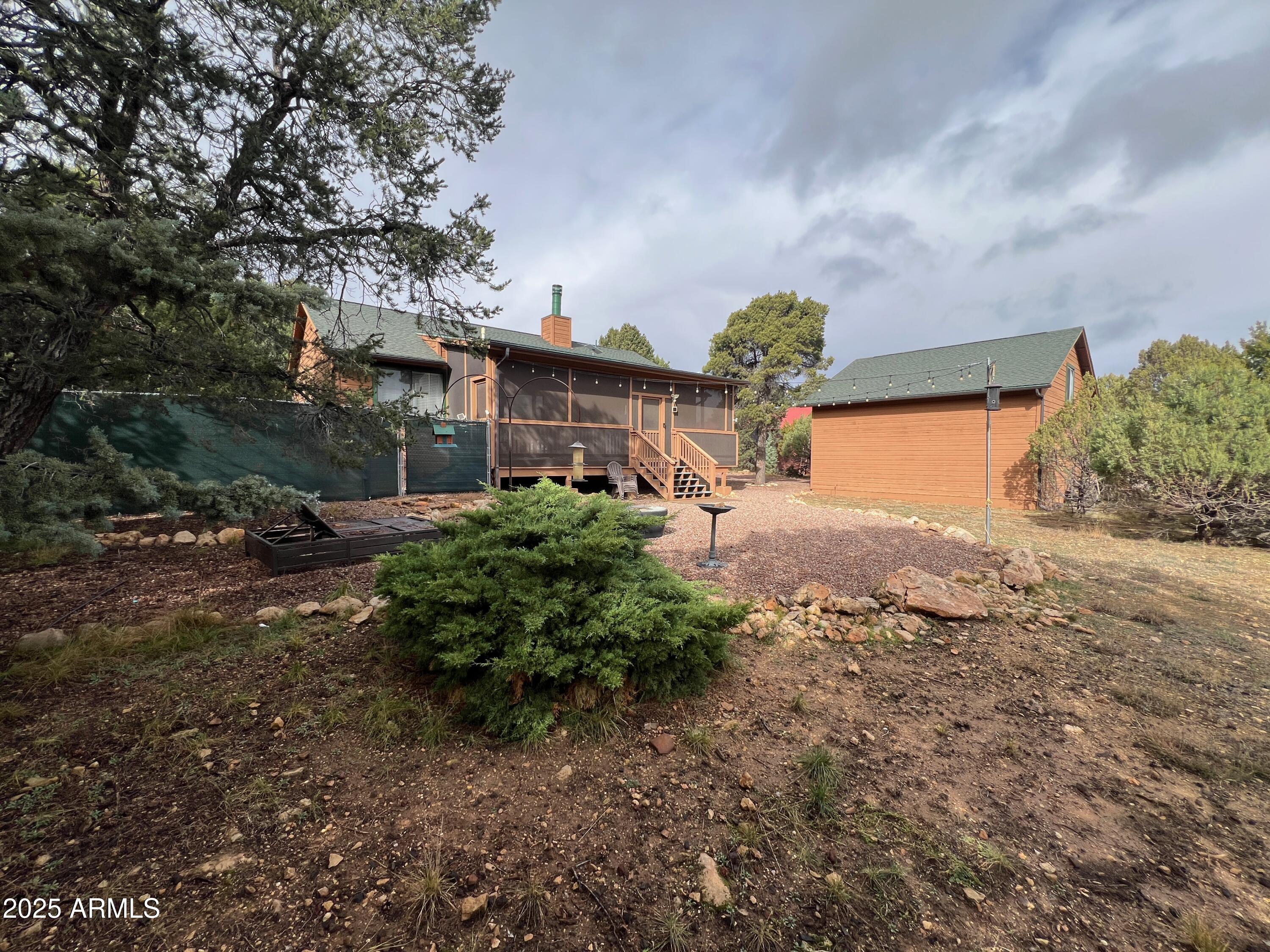 3473 High Country Drive Heber, AZ 85928 - Photo 38 of 38 a backyard of a house with lots of green space