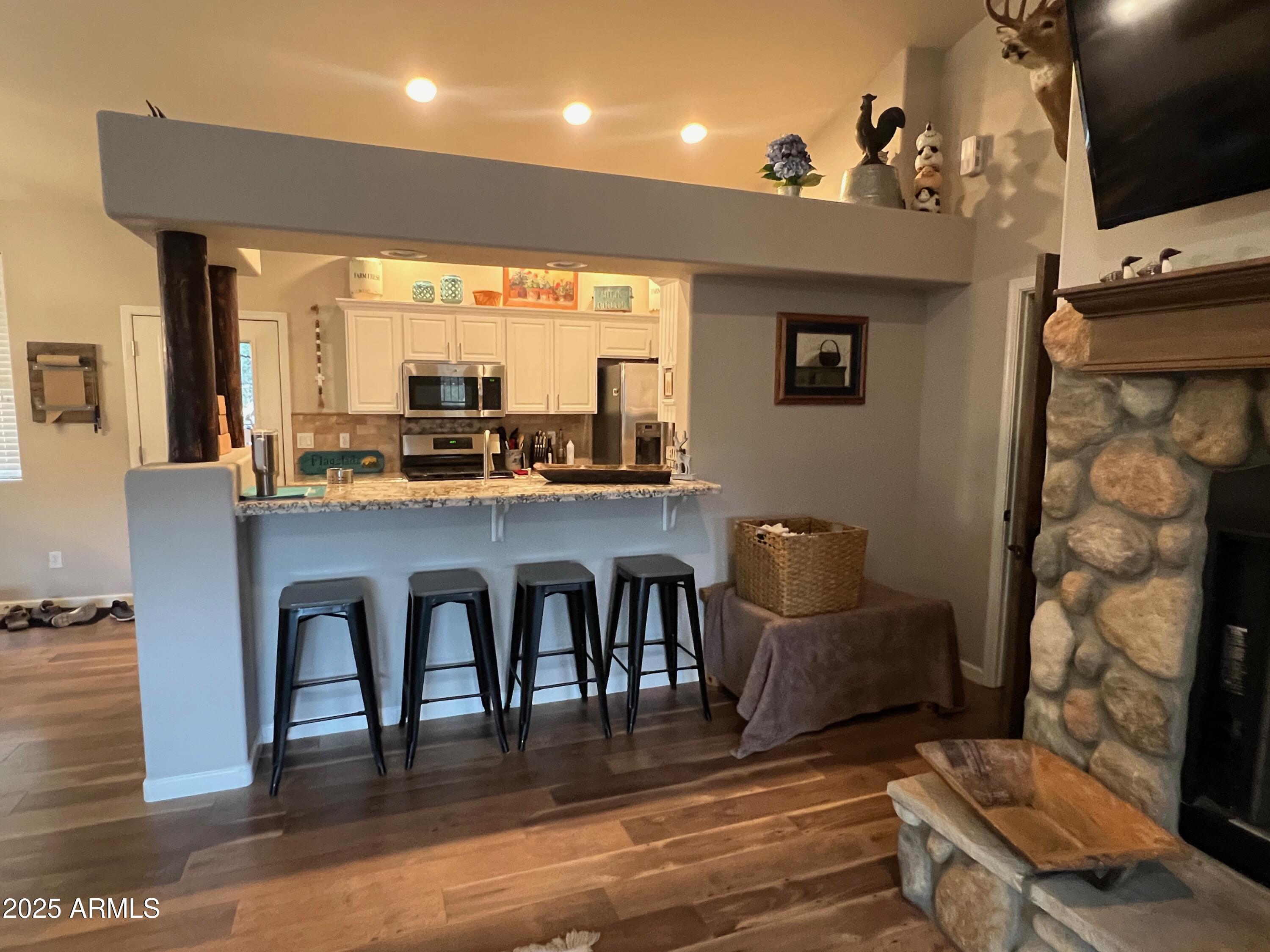 3473 High Country Drive Heber, AZ 85928 - Photo 7 of 38 a view of a dining room with furniture window and wooden floor