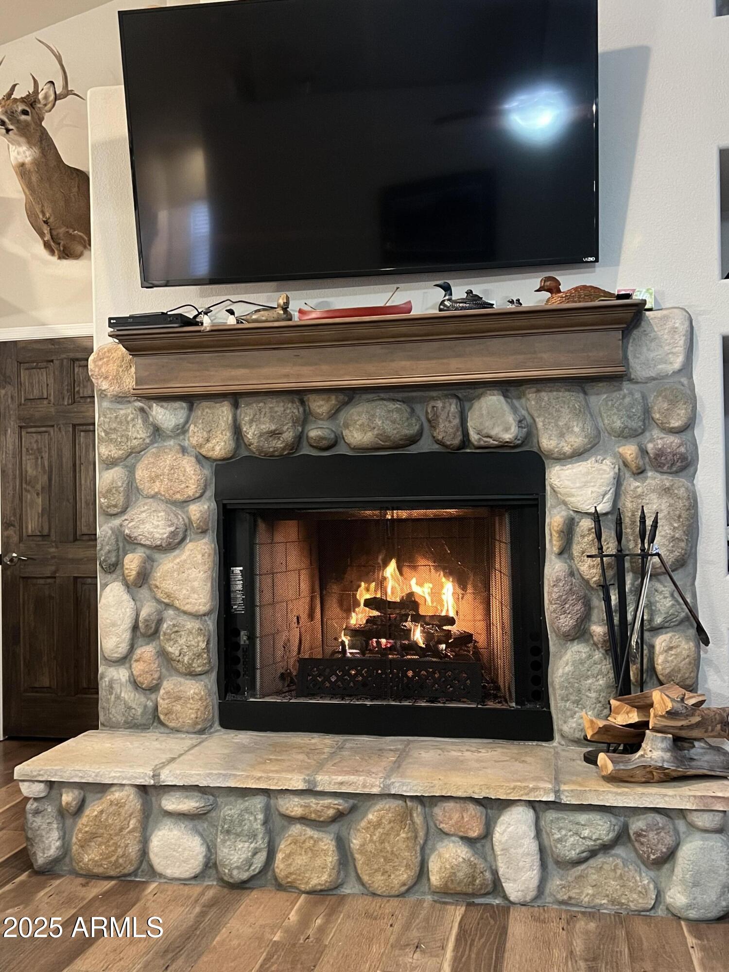3473 High Country Drive Heber, AZ 85928 - Photo 10 of 38 a living room with furniture and a fireplace