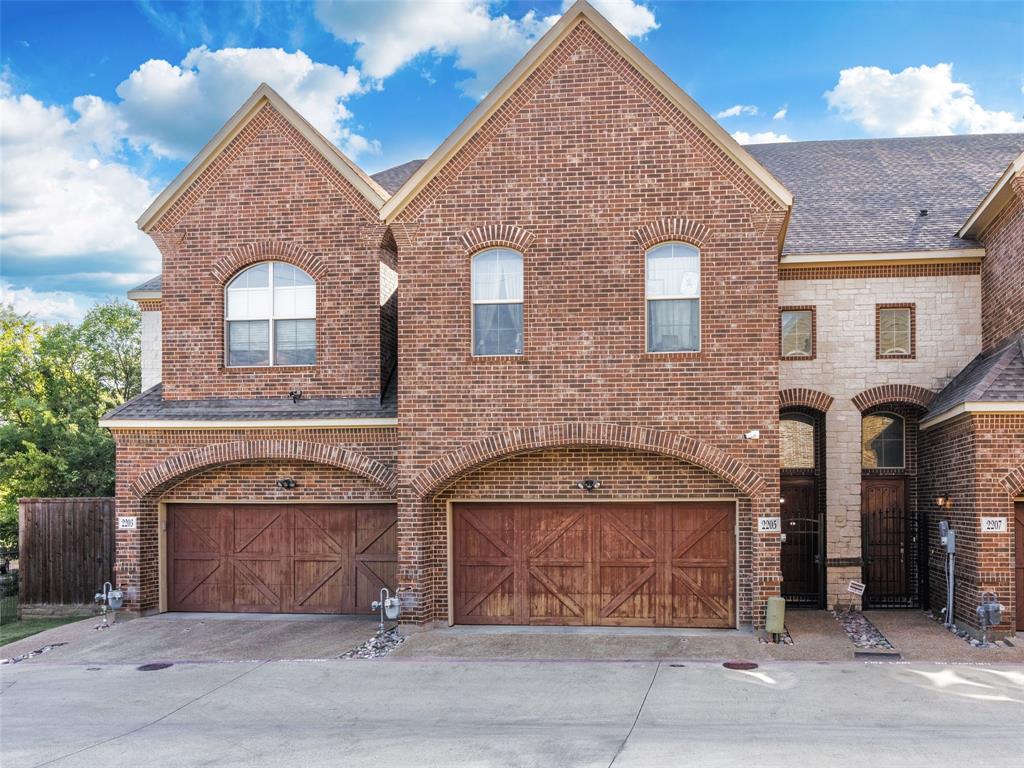 2205 Eriksson Lane Dallas, TX 75204 - Photo 1 of 1 a front view of a house with yard