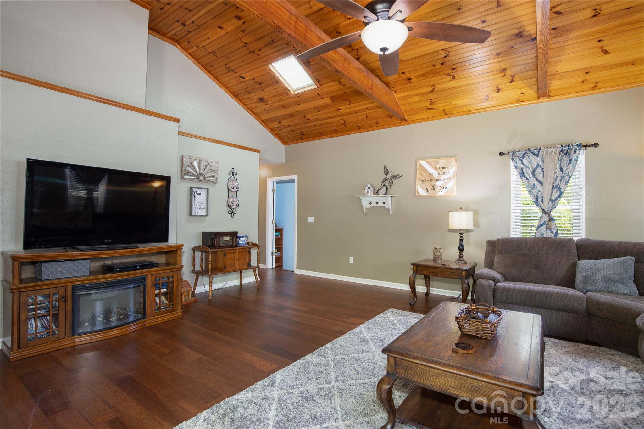 84 Sheets Farm Road Bakersville, NC 28705 - Photo 29 of 42 a living room with furniture and a flat screen tv