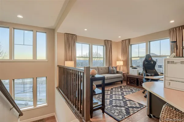 a bathroom with a bathtub shower sink vanity and toilet