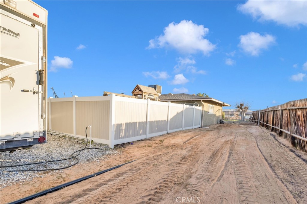21940 Carlisle Road Apple Valley, CA 92307 - Photo 32 of 32 a view of a backyard