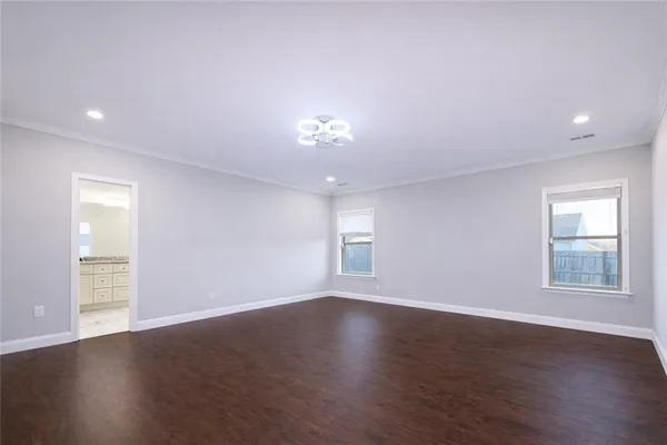 a view of an empty walk in closet
