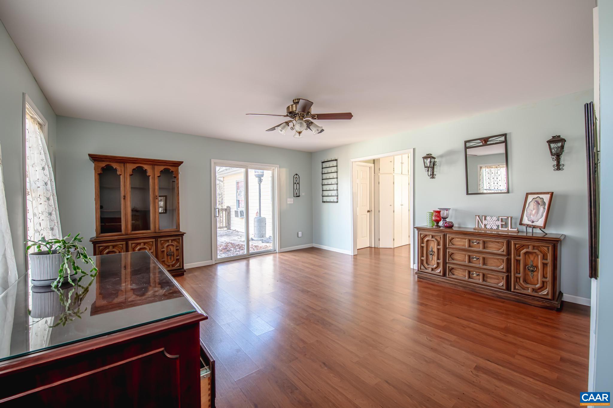18 Cliftwood Road Palmyra, VA 22963 - Photo 12 of 28 a living room with furniture and a wooden floor