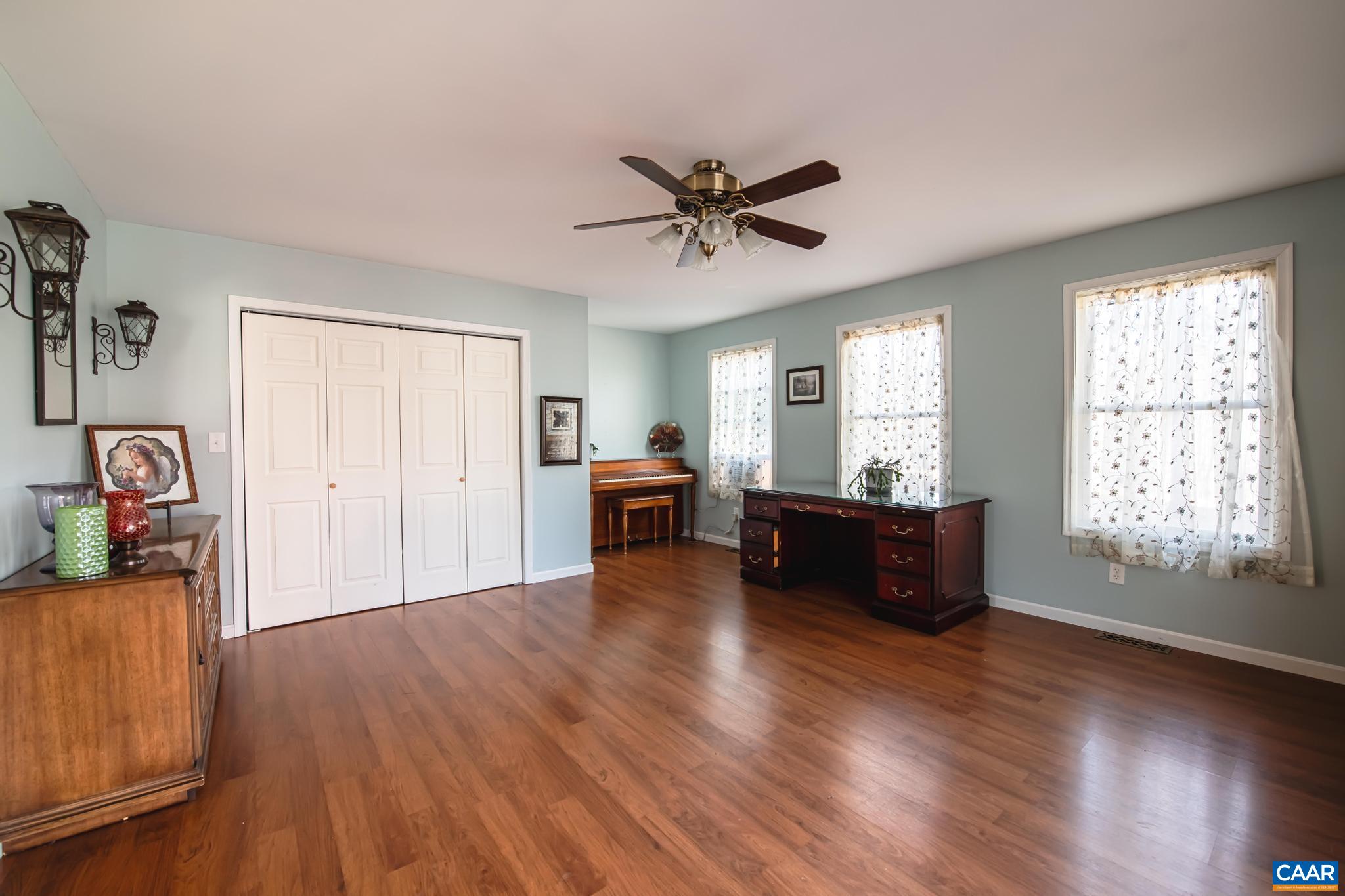 18 Cliftwood Road Palmyra, VA 22963 - Photo 14 of 28 a living room with furniture and a wooden floor