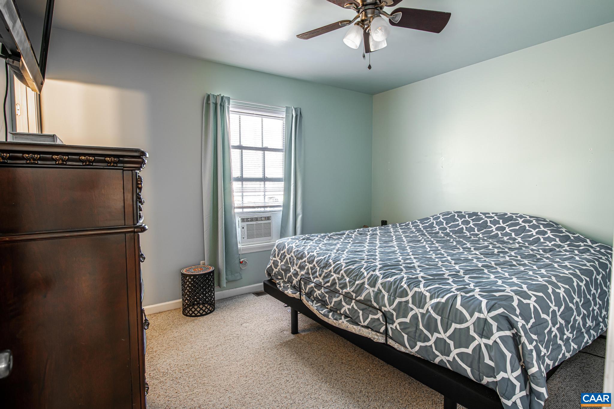 18 Cliftwood Road Palmyra, VA 22963 - Photo 15 of 28 a bedroom with a bed and a window