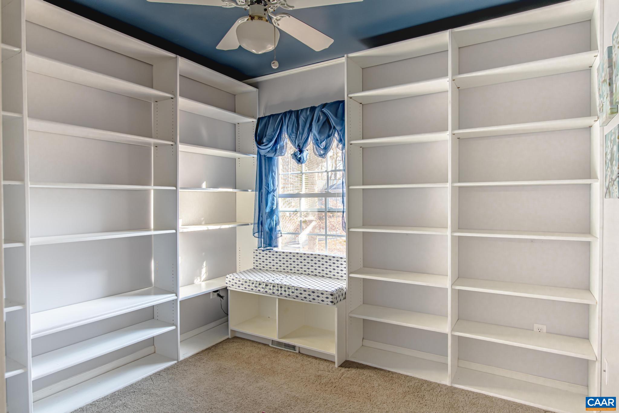 18 Cliftwood Road Palmyra, VA 22963 - Photo 18 of 28 a room with closet and chandelier