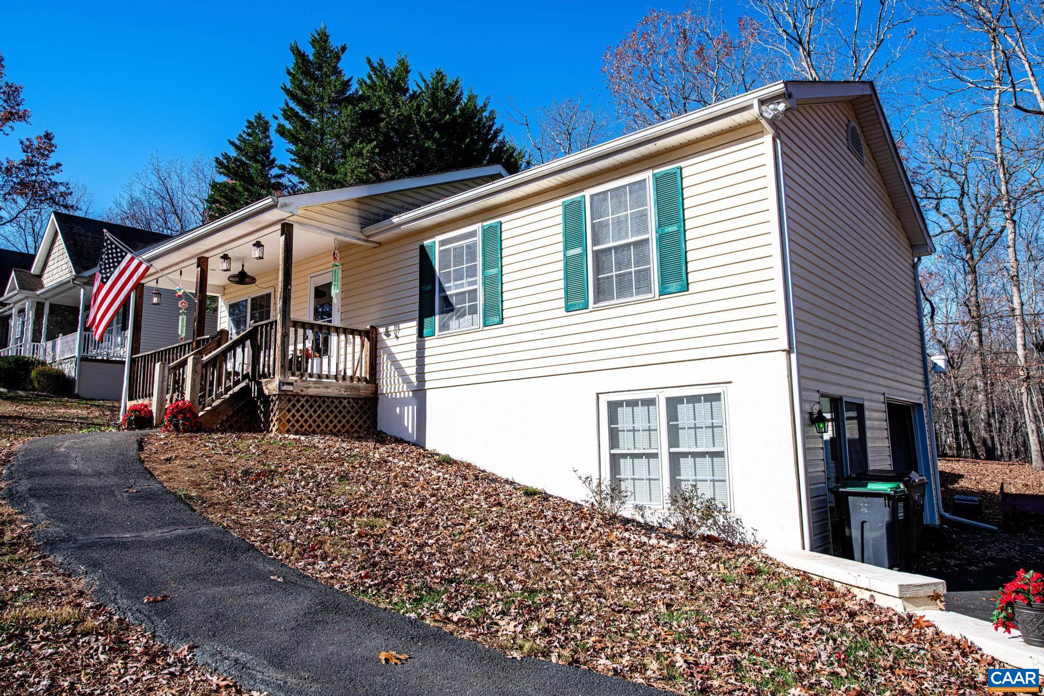 18 Cliftwood Road Palmyra, VA 22963 - Photo 2 of 28 a front view of a house with balcony