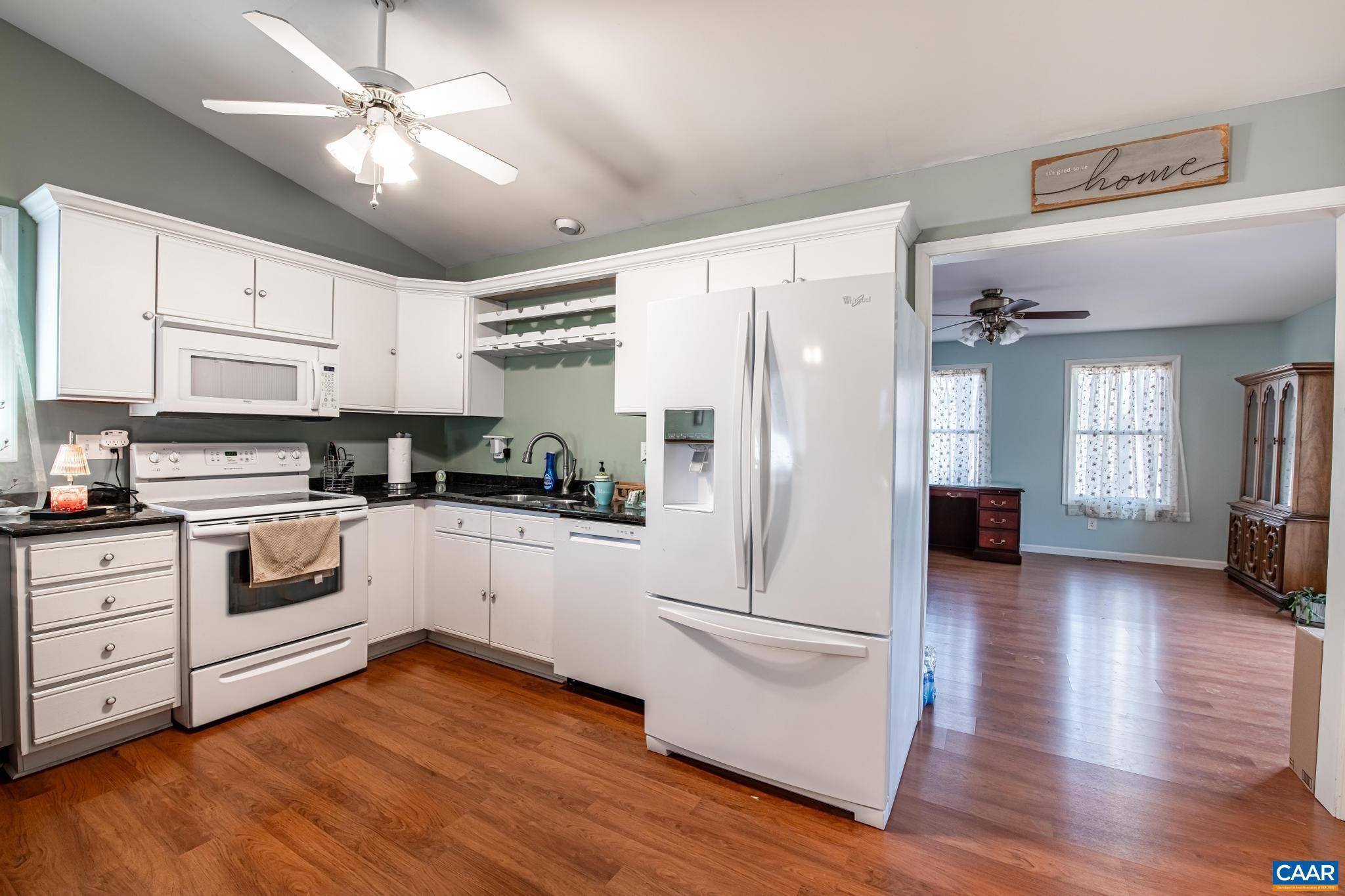 18 Cliftwood Road Palmyra, VA 22963 - Photo 4 of 28 a kitchen with white cabinets and white appliances
