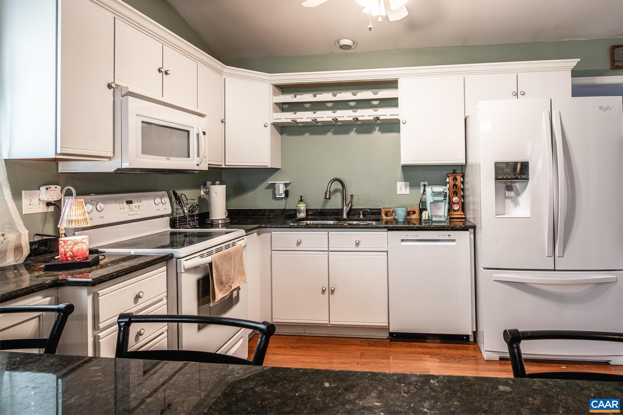 18 Cliftwood Road Palmyra, VA 22963 - Photo 6 of 28 a kitchen with stainless steel appliances a refrigerator sink and cabinets